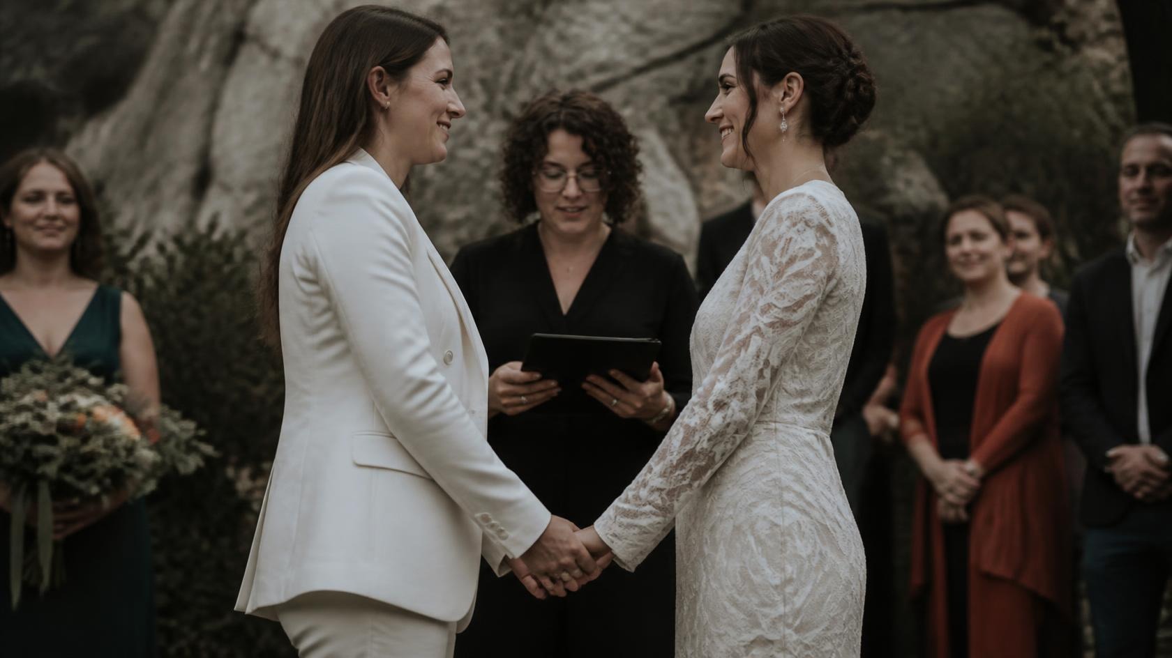 Bride and family sharing a quiet prayer together before the wedding ceremony